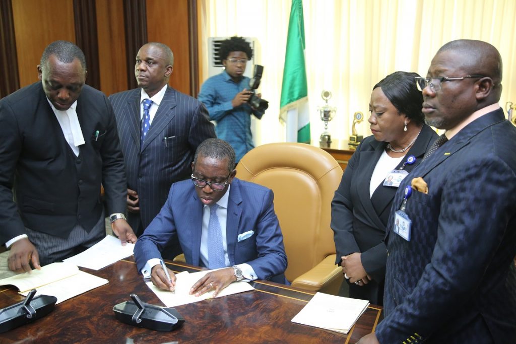 Okowa signs 2020 budget into law