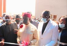 Delta Governor ,Senator Dr. Ifeanyi Okowa ( middle) cutting the tape to inaugurate the newly established Royal Mira British College, Owa Oyibu in Ika North East LGA of Delta State on Tuesday. He is flanked on his immediate left by the President of the School, Elder Moses Iduh and wife, Mrs Ogochukwu Iduh. On the Governor's immediate right is the member representing Aniocha/ Oshimili Federal Constituency in the House of Representatives, Rt. Hon. Ndudi Elumelu.